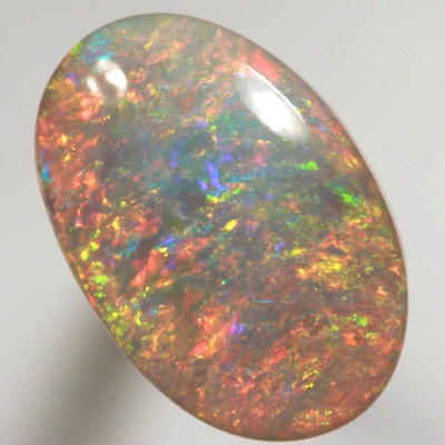 SOLID SEMI BLACK OPAL Top quality. Floral Harlequin pattern, very bright and sparkling golden multicolour. SEE VIDEO  